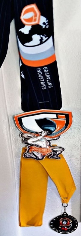 I was Awarded both these metals at The Scrapyard 1 is for entering the shark tank against Vikking Warrior-the bottom one is for winning my fight against sifu Panda